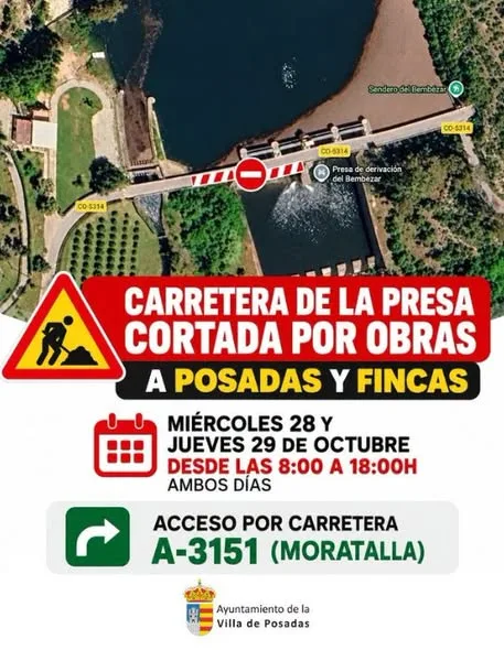 Cartel sobre una vista aérea de una presa que anuncia el corte de la carretera de la presa por obras los días 28 y 29 de octubre.